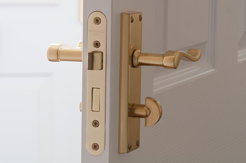 Typical handles for doors in a bathroom